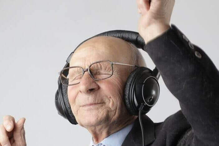 man in black jacket wearing black headphones